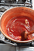 Boiling jam - preparing strawberry jam