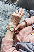 Woman looking at her watch