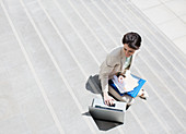 Businesswoman with paperwork