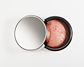 Close up of blush in jar