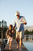 Grandfather and grandson with toy