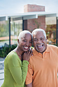 Older couple smiling outdoors