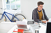 Businessman working at desk in office