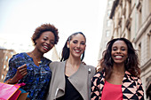 Women walking together on city street