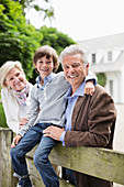 Couple and grandson smiling