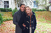 Couple smiling together outdoors