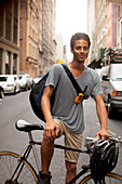 Man on bicycle on city street