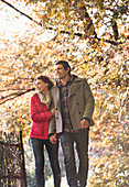 Couple walking together in park