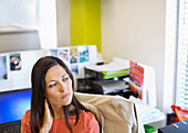 Businesswoman sitting at desk