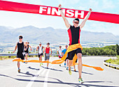 Runner crossing race finish line