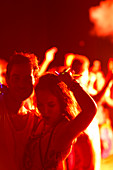 Couple dancing at music festival