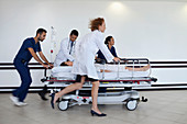 Hospital staff rushing patient