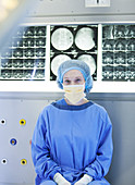 Surgeon sitting with x-rays