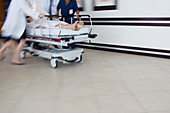 Hospital staff rushing patient