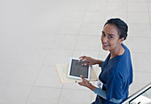 Nurse using tablet computer