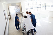 Hospital staff rushing patient