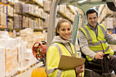 Workers smiling in warehouse