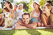 Family relaxing in backyard