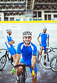 Portrait of track cyclist in velodrome