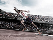 Runner taking off from starting block