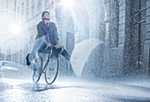 Businessman riding bicycle