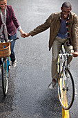 Happy couple riding bicycles