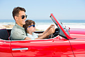 Father and son at beach