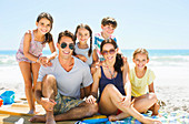 Portrait of smiling family on beach