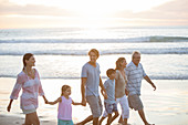 Family walking together on beach