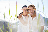 Couple smiling together outdoors