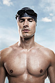 Swimmer wearing cap and goggles