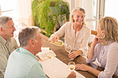 Senior couples drinking wine