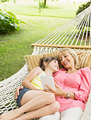 Grandmother and granddaughter with tablet