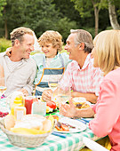 Family enjoying lunch at table