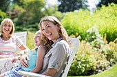 Multi-generation women laughing