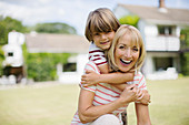 Grandmother and grandson hugging