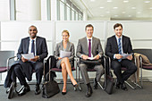 Business people sitting in waiting area