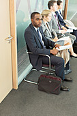 Business people waiting in office