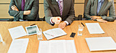 Businessman shaking his finger in meeting