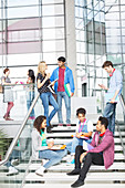 University students talking on steps