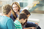 Family relaxing together in living room