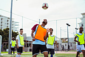 Soccer players training on field