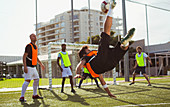 Soccer players training on field