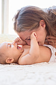 Mother blowing raspberries