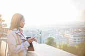 Businesswoman overlooking Paris, France