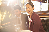 Businesswoman smiling in restaurant