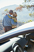 Senior couple looking at mountain view