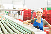 Worker in food processing plant