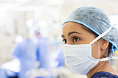 Surgical nurse wearing surgical cap