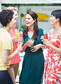 Women talking at party